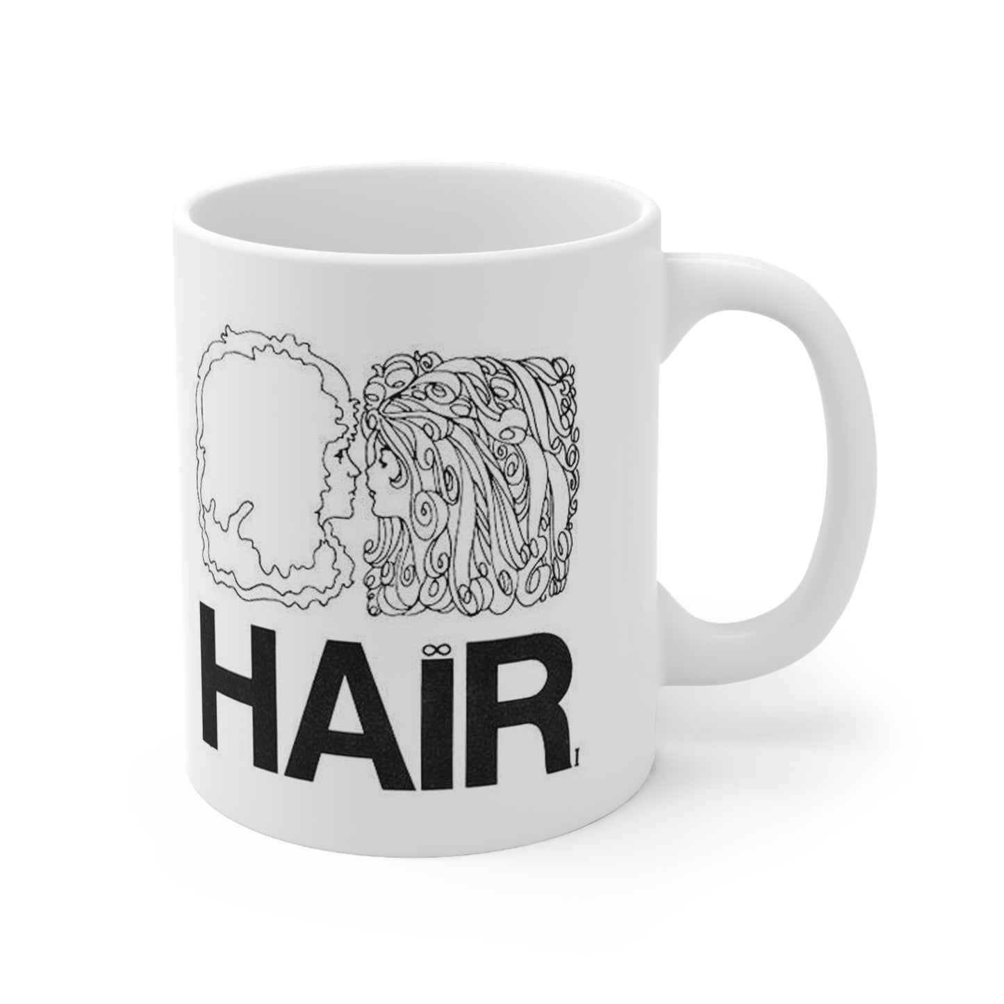 A white ceramic coffee cup with a graphic design of a man and a woman's heads and hair, along with the word 'HIR'.